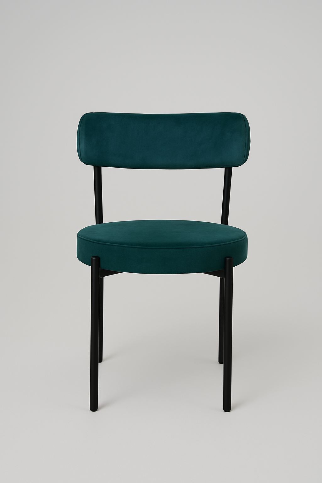 Chaise en velours vert foncé avec piètement en métal noir contemporain.