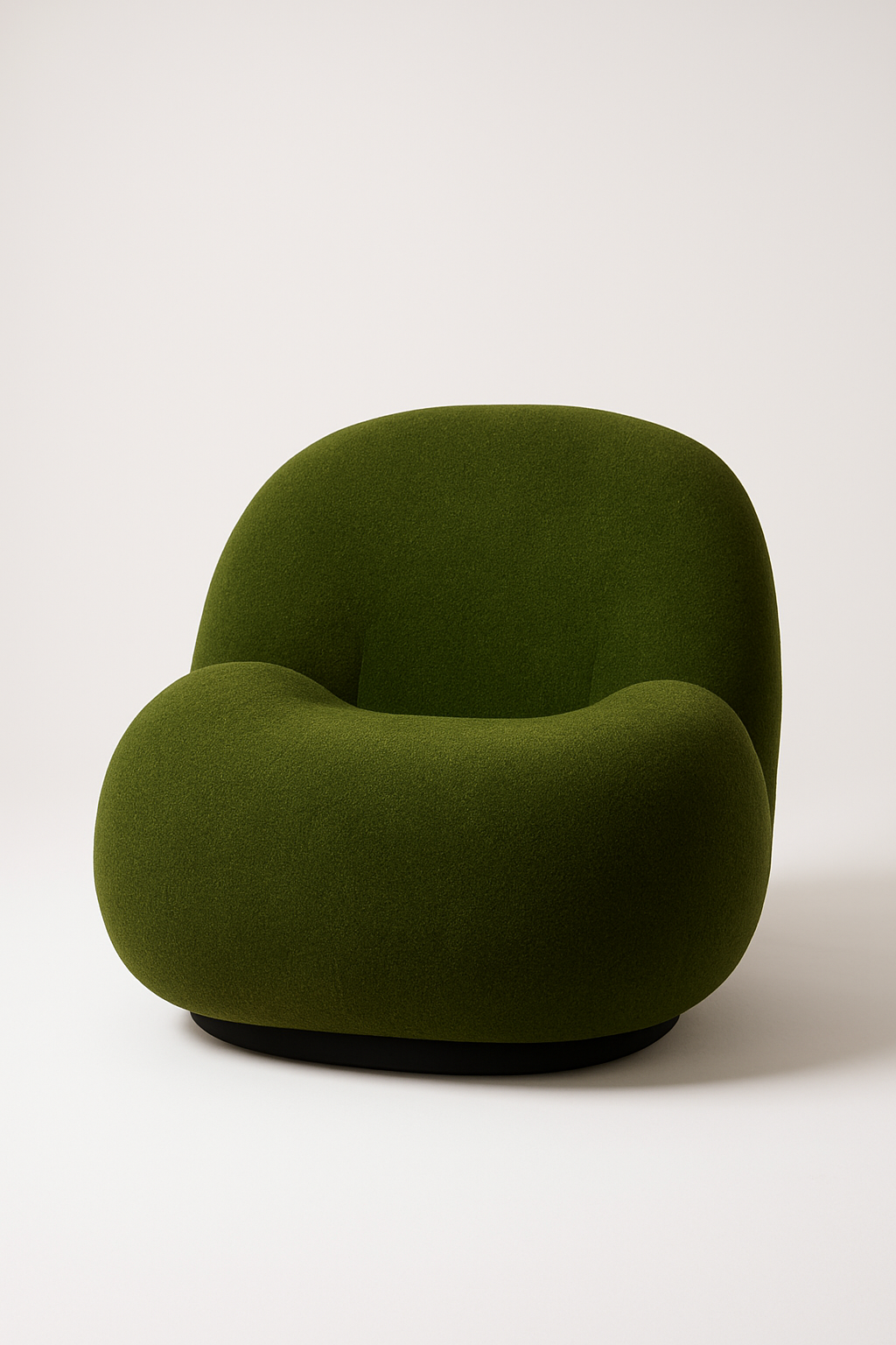 Fauteuil contemporain en tissu vert texturé, assise large et forme organique